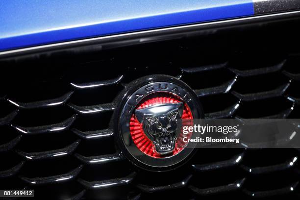 Jaguar badge is seen on the front grille of a Jaguar Land Rover Automotive Plc XE SV Project 8 vehicle during a reveal event in Los Angeles,...