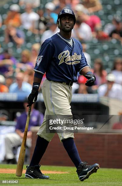 Tony Gwynn Jr. #18 of the San Diego Padres heads to the dugout after striking out against the Colorado Rockies during MLB action at Coors Field on...