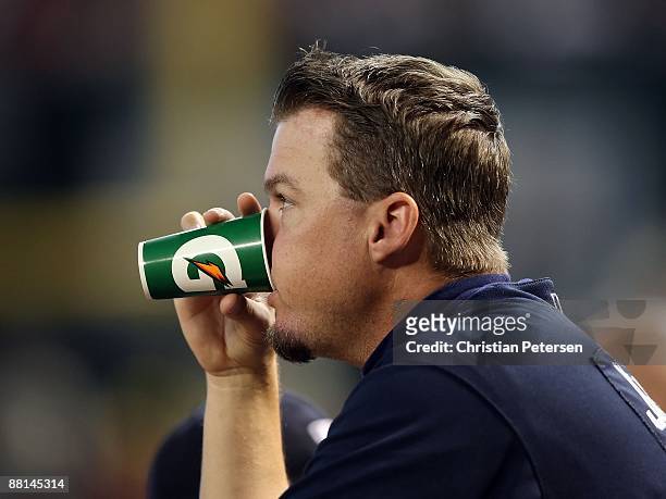 Chipper Jones of the Atlanta Braves drinks from a gatorade cup during the major league baseball game against the Arizona Diamondbacks at Chase Field...