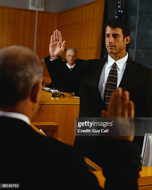 Swearing Oath Court Photos and Premium High Res Pictures Getty Images Swearing Oath Court Photos and Premium High Res Pictures Getty Images