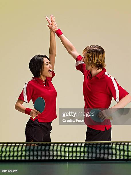 Double High Five Photos and Premium High Res Pictures - Getty Images