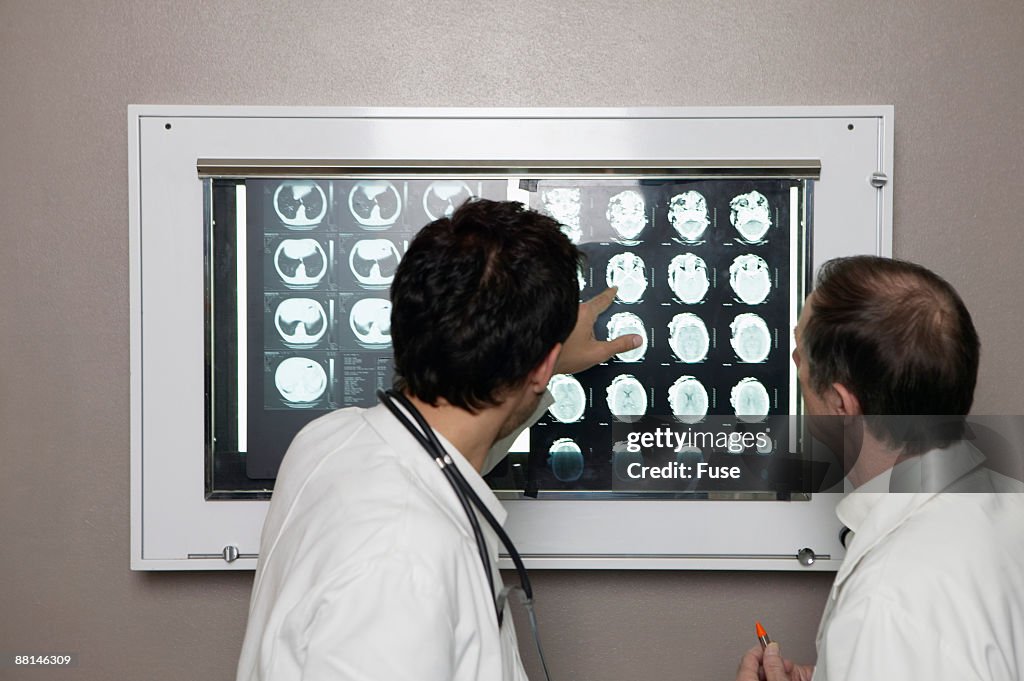 Doctors Looking at X-Ray