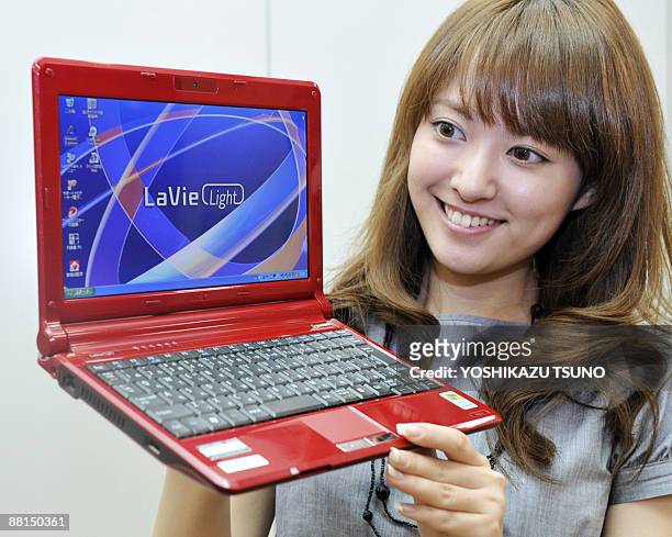 Model displays Japanese computer giant NEC's new notebook PC "LaVie Light BL350", equpped with Intel's ATOM processor on its CPU, 10.1-inch LCD...
