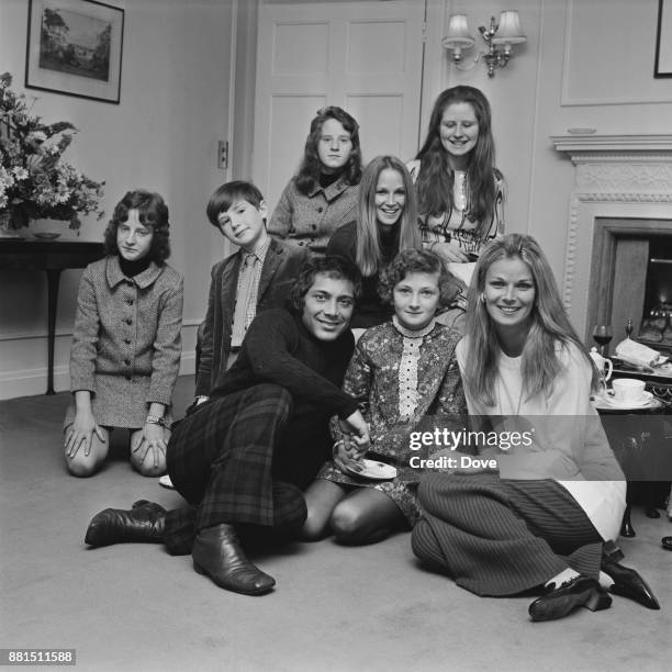 Canadian-American singer-songwriter and actor Paul Anka with his wife Anne De Zogheb and relatives in London, UK, 11th January 1971.