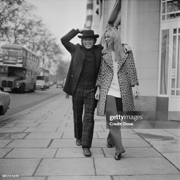 Canadian-American singer-songwriter and actor Paul Anka with his wife Anne De Zogheb , London, UK, 11th January 1971.