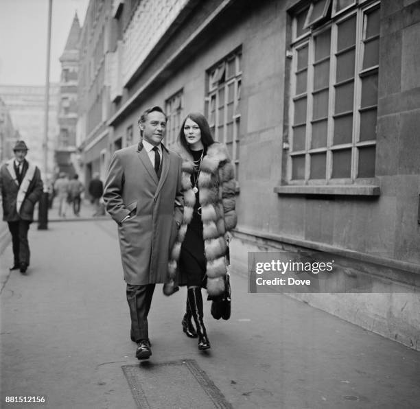 Irish-born British actor Richard Todd with his wife, fashion model Virginia Mailer, in Soho, London, UK, 8th February 1971.