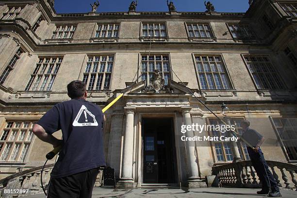 Professional window cleaners Nick Walker and Daniel Barr clean the windows at the front of Longleat House, ahead of the summer season on June 2, 2009...