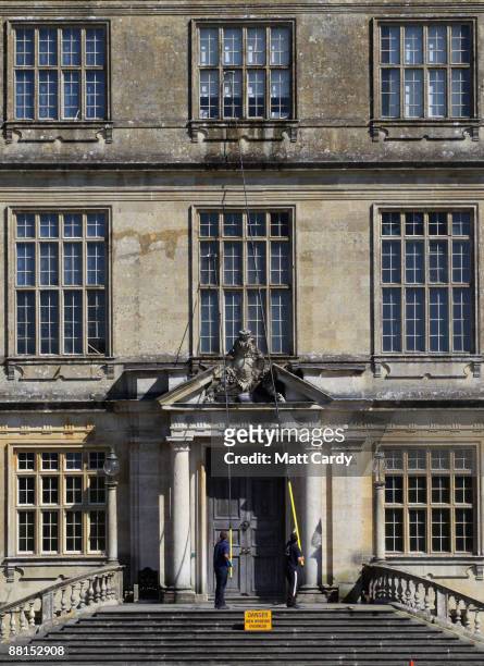 Professional window cleaners Nick Walker and Daniel Barr clean the windows at the front of Longleat House, ahead of the summer season on June 2, 2009...