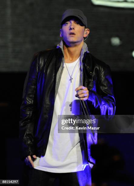 Rapper Eminem performs at the launch of "DJ Hero" hosted by ActiVision held at The Wiltern on June 1, 2009 in Los Angeles, California.