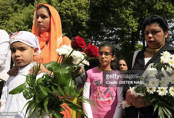 Some 500 followers gather as the corpse of Guru Sant Rama Nand is laid out at Vienna's central cemetery after he died from injuries sustained during...