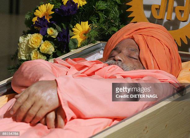 The corpse of Guru Sant Rama Nand lays at state at Vienna's central cemetery after he died from injuries sustained during a shooting at a Sikh...