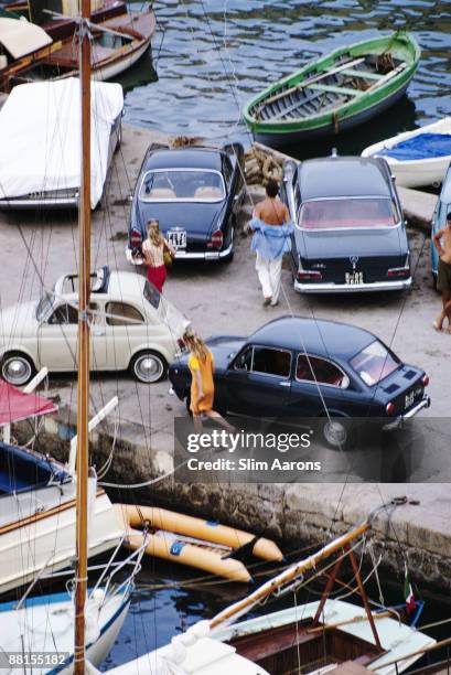 Boats and cars at the harbour, Porto Ercole, Tuscany, August 1967.