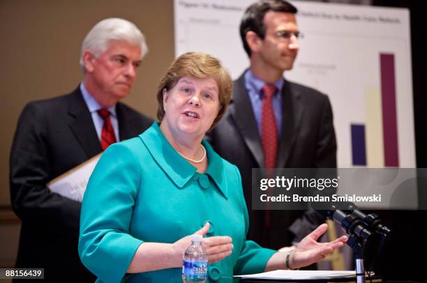 Senator Christopher Dodd and Office of Management and Budget Director Peter R. Orszag listen while Christina Romer , chair of the Council of Economic...