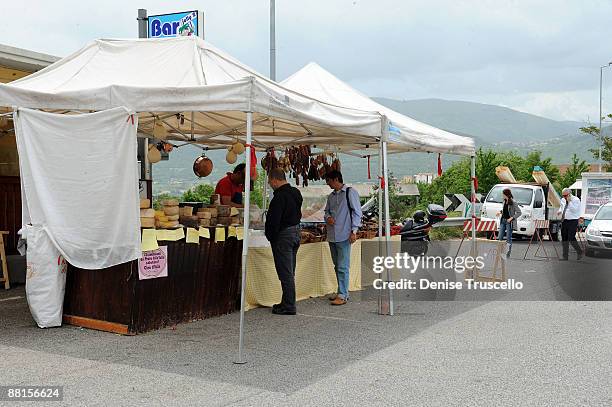 Guido Aconito works at his brothe's deli that was once in the center of L'Aquila, which was moved due to the 6.3 magnitude earthquake that struck the...