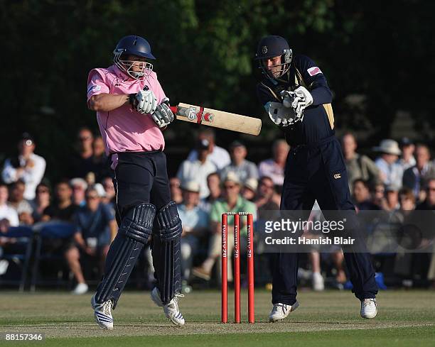 Billy Godleman of Middlesex plays and misses as Nic Pothas of Hampshire takes the ball during the Twenty20 match between Middlesex and Hampshire at...