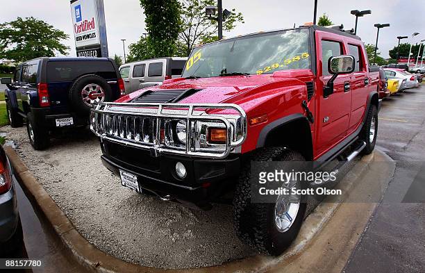Hummer vehicles are offered for sale at Woodfield Hummer, a Hummer and Chevrolet dealerhip, June 2, 2009 in Schaumburg, Illinois. According to...