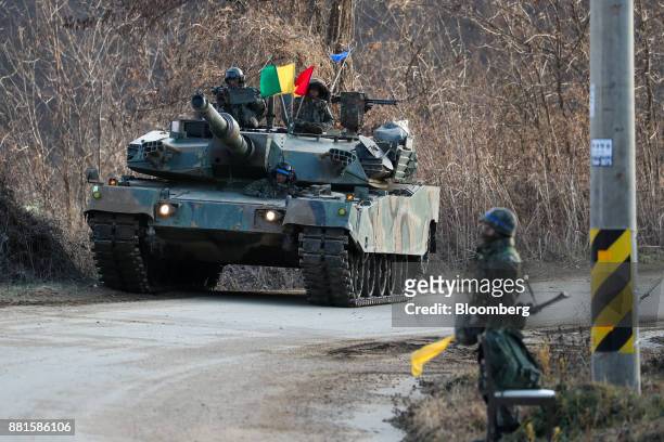 South Korean soldiers ride in a tank during a military exercise near the border in Paju, South Korea, on Wednesday, Nov. 29, 2017. South Korea's...