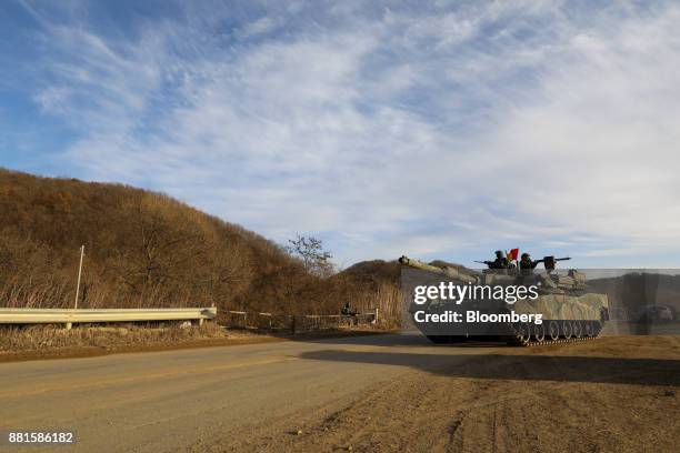 South Korean soldiers ride in a tank during a military exercise near the border in Paju, South Korea, on Wednesday, Nov. 29, 2017. South Korea's...