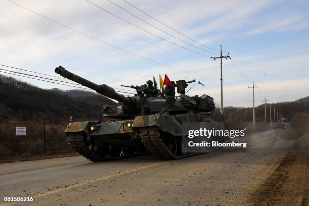 South Korean soldiers ride in a tank during a military exercise near the border in Paju, South Korea, on Wednesday, Nov. 29, 2017. South Korea's...