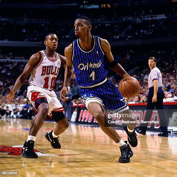 Anfernee Hardaway of the Orlando Magic drives to the basket past BJ Armstrong of the Chicago Bulls in Game Three of the Eastern Conference Semifinals...