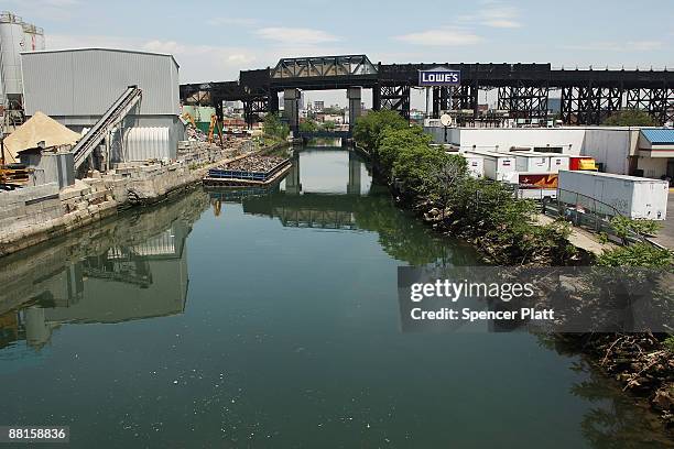 Commercial sites line the polluted Gowanus Canal on June 2, 2009 in the Brooklyn borough of New York City. The Gowanus Canal is bounded by several...