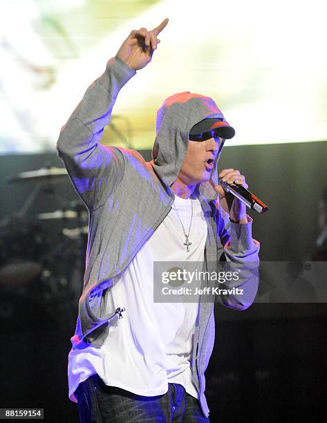 Rapper Eminem performs at the launch of "DJ Hero" hosted by ActiVision held at The Wiltern on June 1, 2009 in Los Angeles, California.