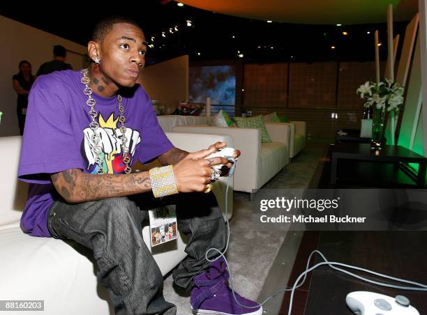 Rapper Soulja Boy plays XBox at the XBox Booth at E3 Expo at Los Angeles Convention Center on June 2, 2009 in Los Angeles, California.