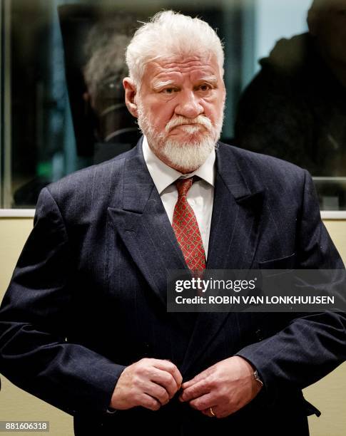 Croatian former general Slobodan Praljak arrives at the International Criminal Tribunal for the former Yugoslavia , prior to the judgement in his...