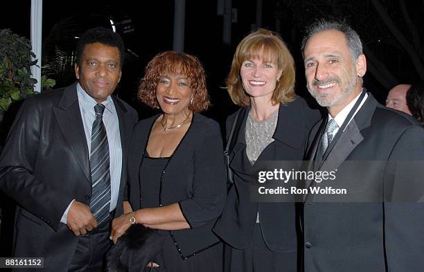 Charley Pride, Rozene Pride, Les Bider, MusiCares Foundation Board Chairman , and guest