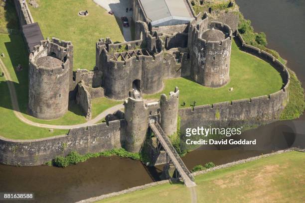 An aerial photograph of the mediaeval moti Caerphilly Castle on 14th of July 2017. This 13th century fortification was built by Gilbert de Clare as a...