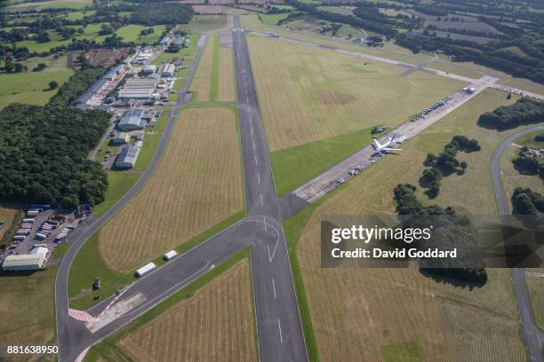 Aerial photograph of Dunsfold Aerodrome, made famous by the TV program Top Gear, the location for its track and studio on August 20th 2017. This old...