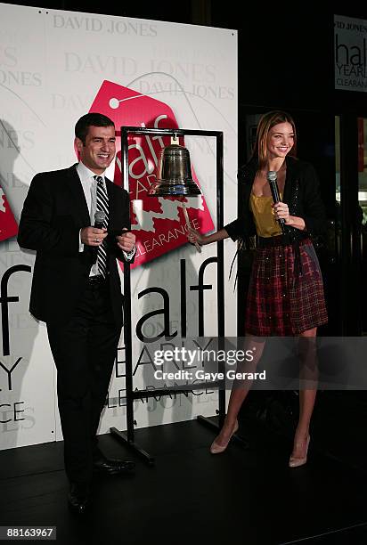 Model Miranda Kerr rings the bell during the official launch of the David Jones Half Yearly Clearance at the David Jones Elizabeth Street Store on...