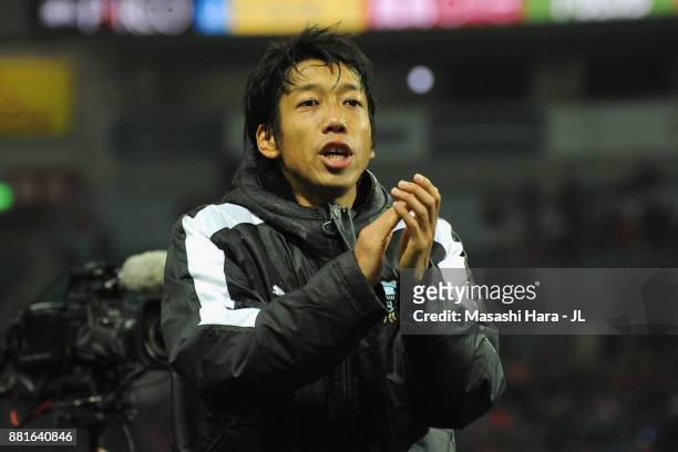 Kengo Nakamura of Kawasaki Frontale applauds supporters after his side's 1-0 Victory in the J.League J1 match between Urawa Red Diamonds and Kawasaki...
