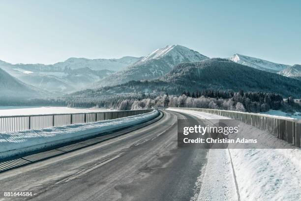 sunny winter bridge - christian kalt stock-fotos und bilder