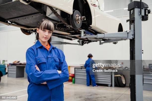 portrait of a mechanic - overalls stock pictures, royalty-free photos & images