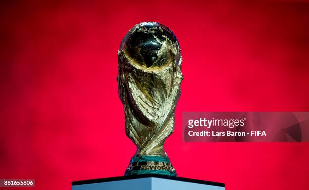 The World Cup trophy is seen on stage during the Behind the Scenes of the Final Draw for the 2018 FIFA World Cup at the Draw hall on November 29,...