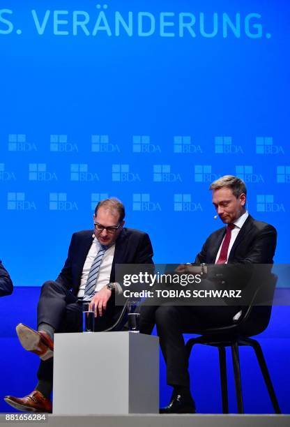 Christian Lindner , leader of Germany's free democrat FDP party, and German Transport Minister Alexander Dobrindt of the conservative Christian...