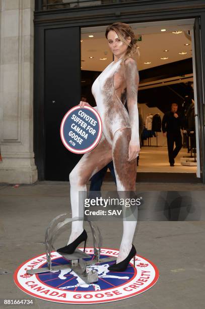 Glamour model Rhian Sugden joins PETA's campaign protesting Canada Goose's use of fur outside the Canada Goose store on Regent's Street - November...