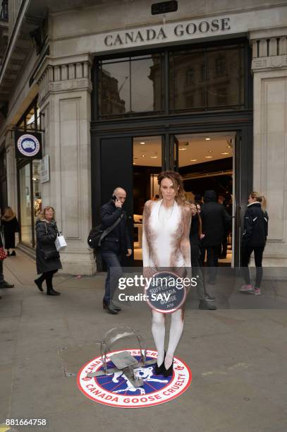 Glamour model Rhian Sugden joins PETA's campaign protesting Canada Goose's use of fur outside the Canada Goose store on Regent's Street - November...