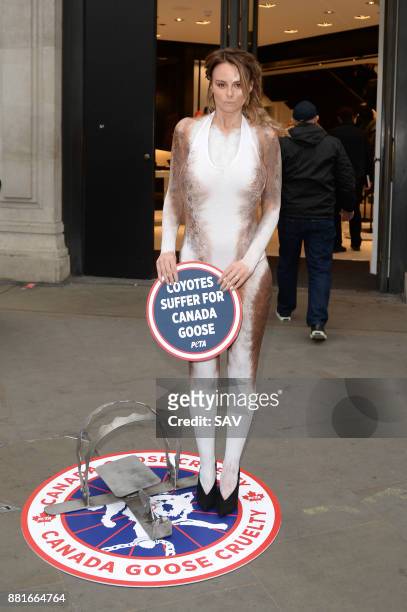 Glamour model Rhian Sugden joins PETA's campaign protesting Canada Goose's use of fur outside the Canada Goose store on Regent's Street - November...