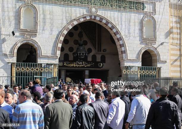 People carry the coffin of Egyptian actress and singer Shadia during the funeral ceremony at the Sayyida Nafisa mosque in Cairo, Egypt on November...