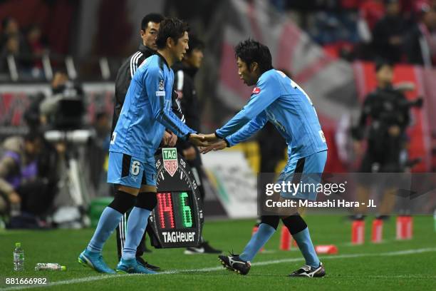 Kengo Nakamura of Kawasaki Frontale is repleaced by Yusuke Tasaka during the J.League J1 match between Urawa Red Diamonds and Kawasaki Frontale at...