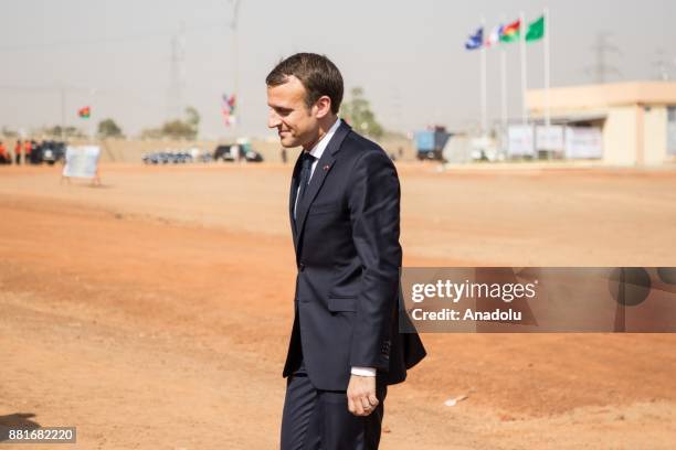 French President Emmanuel Macron arrives to attend the opening ceremony of a solar energy plant in Ouagadougou, Burkina Faso on November 29, 2017.