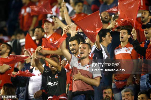 Fans of Independiente cheer for their team during a second leg match between Independiente and Libertad as part of the semifinals of Copa CONMEBOL...