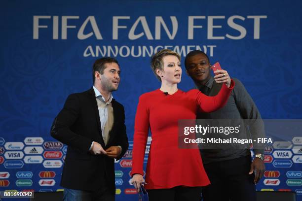 Alexander Kerzhakov, Yana Churikova and Marcel Desailly pose for a selfie during the announcement of the new 2018 FIFA Fan Fest Ambassadors for the...