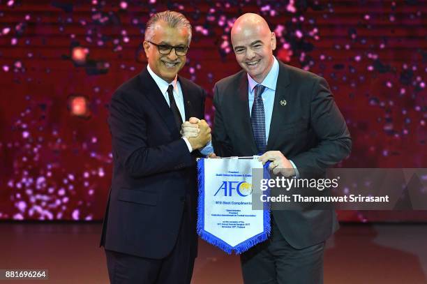 President Shaikh Salman bin Ebrahim Al Khalifa and FIFA president Gianni Infantino smiles during the 2017 AFC Annual Awards on November 29, 2017 in...