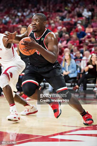 Terrell Carter II of the Fresno State Bulldogs drives to the basket during a game against the Arkansas Razorbacks at Bud Walton Arena on November 17,...