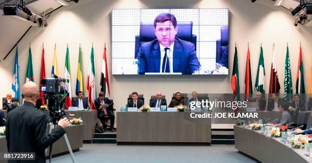 Russian energy minister Alexander Novak , Kuwait's Oil minister Essam al-Marzouk, OPEC Secretary General Mohammed Barkindo and OPEC Conference...