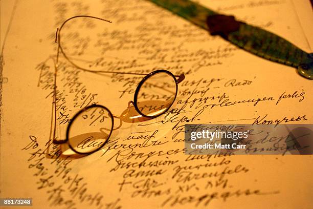 eyeglasses with parchment and letter opener - abrecartas fotografías e imágenes de stock