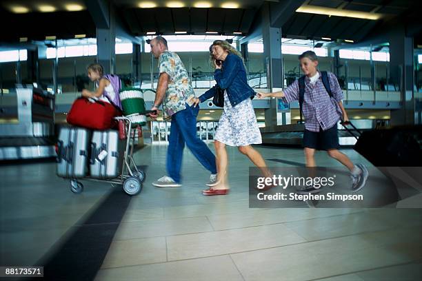 Parents Rushing Kids 51 Mom Rushing With Kids Stock Photos, High-Res Pictures, and Images ...